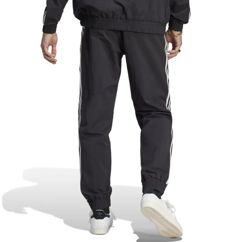 Tracksuits*adidas Originals NSRC Track Pants in Black