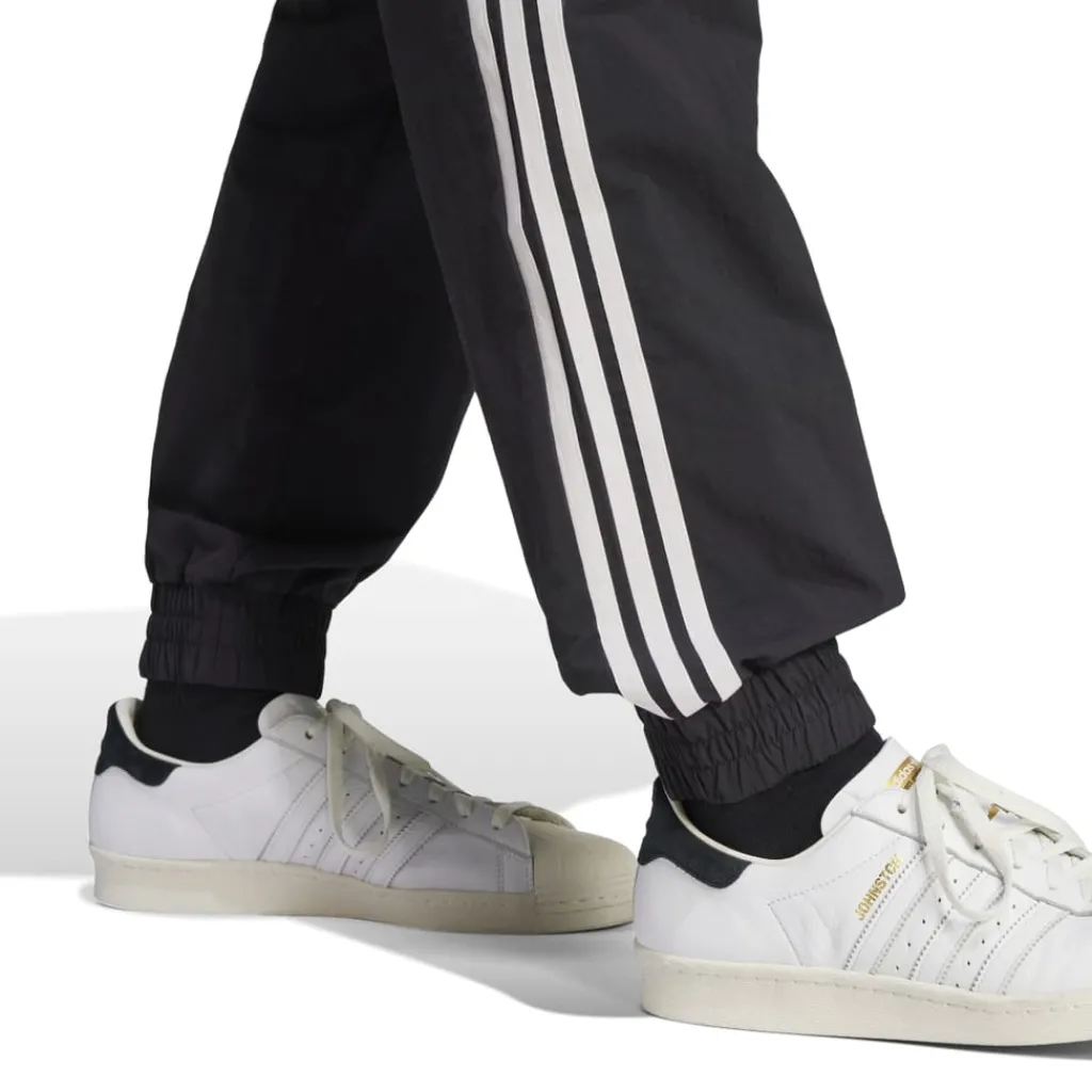 Tracksuits*adidas Originals NSRC Track Pants in Black