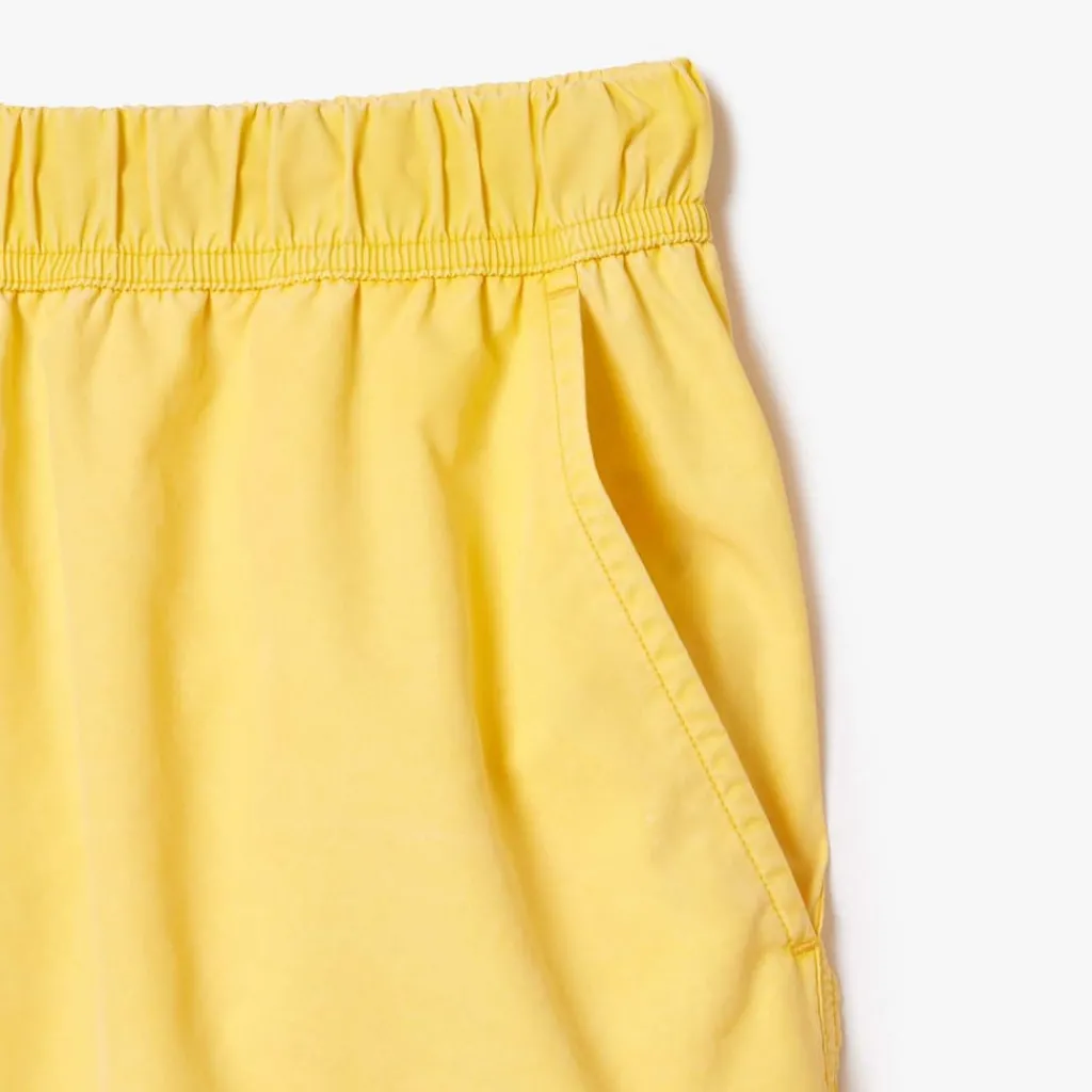 Shorts*Lacoste Mid Length Washed Effect Swim Trunks in Yellow