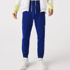 Trousers*Lacoste Sport Zip Pockets Tapered Tracksuit Bottoms in Multi colour
