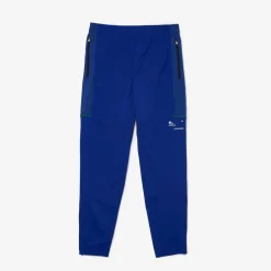 Trousers*Lacoste Sport Zip Pockets Tapered Tracksuit Bottoms in Multi colour