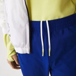 Trousers*Lacoste Sport Zip Pockets Tapered Tracksuit Bottoms in Multi colour