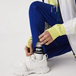Trousers*Lacoste Sport Zip Pockets Tapered Tracksuit Bottoms in Multi colour