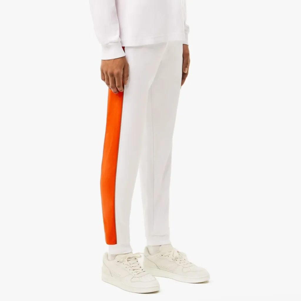 Trousers*Lacoste Tapered Leg Sweatpants in white orange