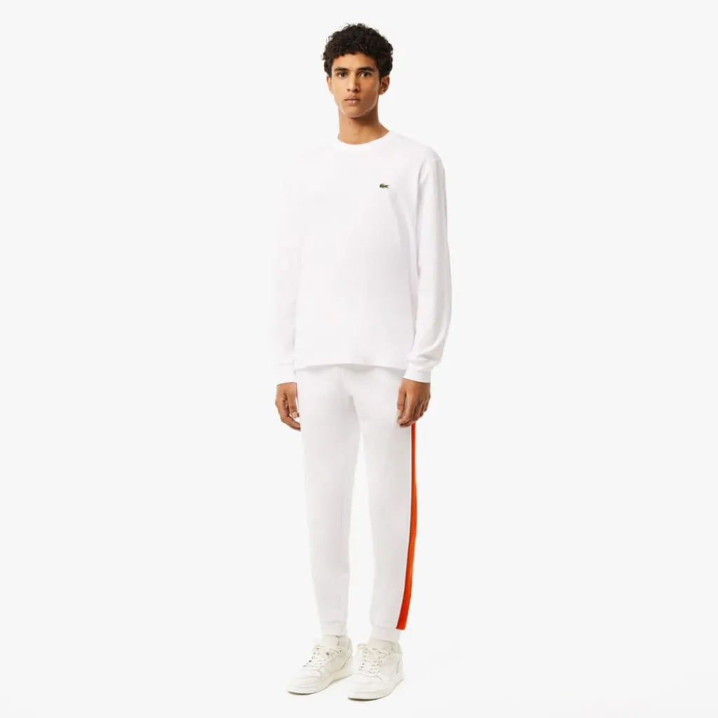 Trousers*Lacoste Tapered Leg Sweatpants in white orange