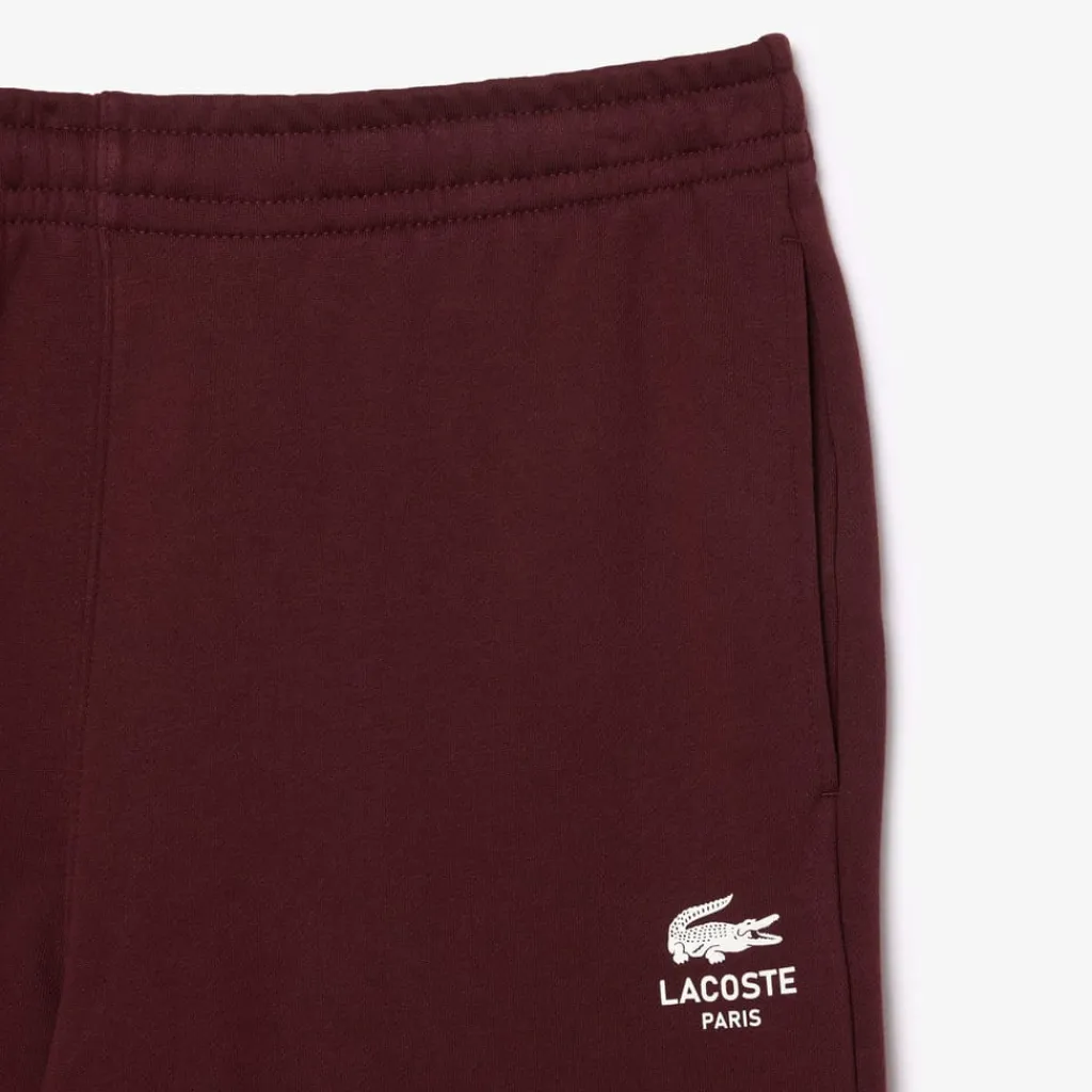 Trousers*Lacoste Tapered Leg Sweatpants in red maroon